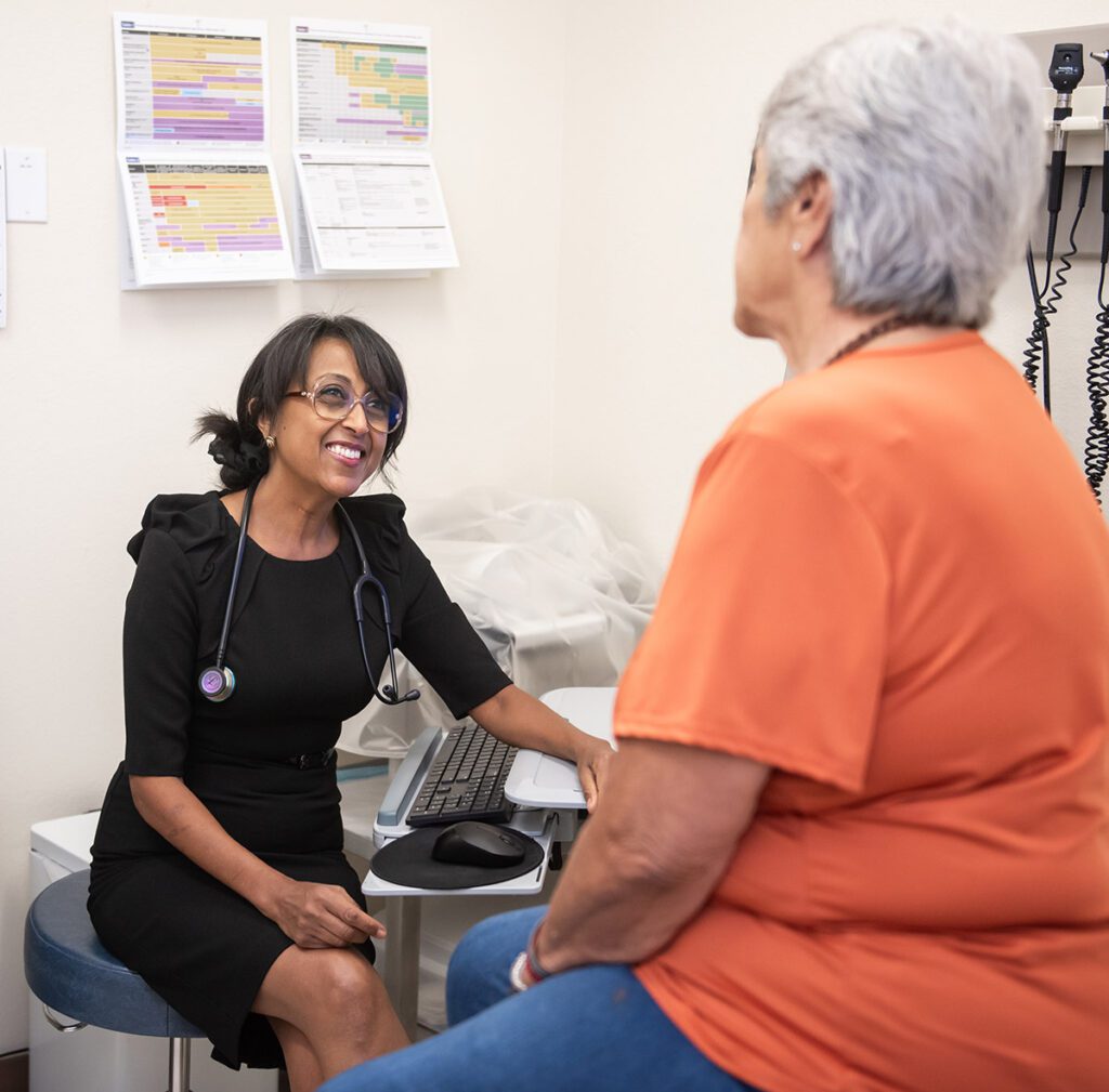 A doctor talking with her patient.