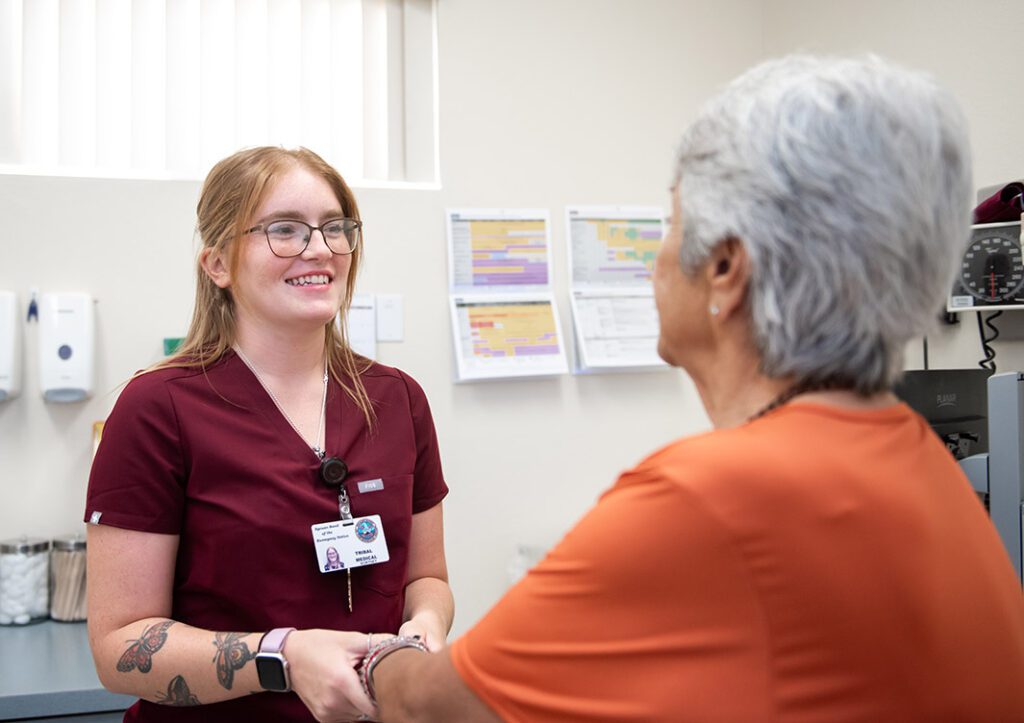 A nurse examining a patient.